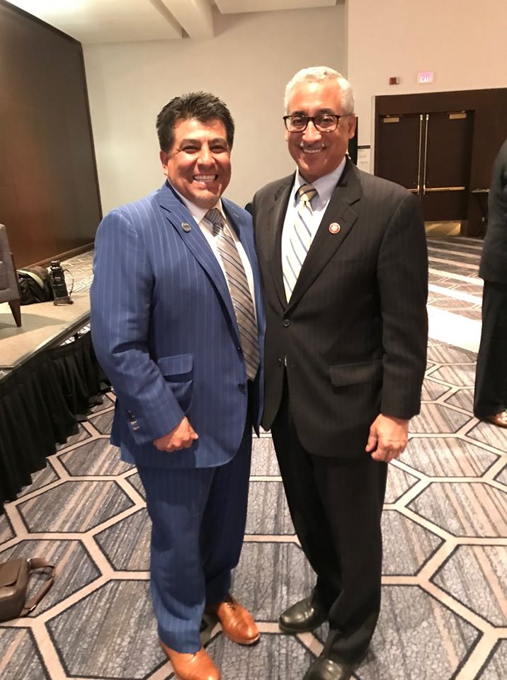 Dr. Johnny Garcia posing with Congressman Bobby Scott at the Hampton Roads Chamber Diversity in Business Forum.