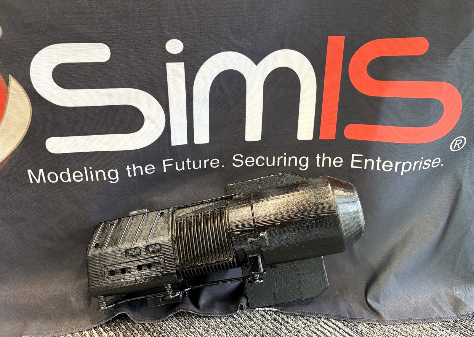 Black FDM 3D-printed assembly with visible layer lines